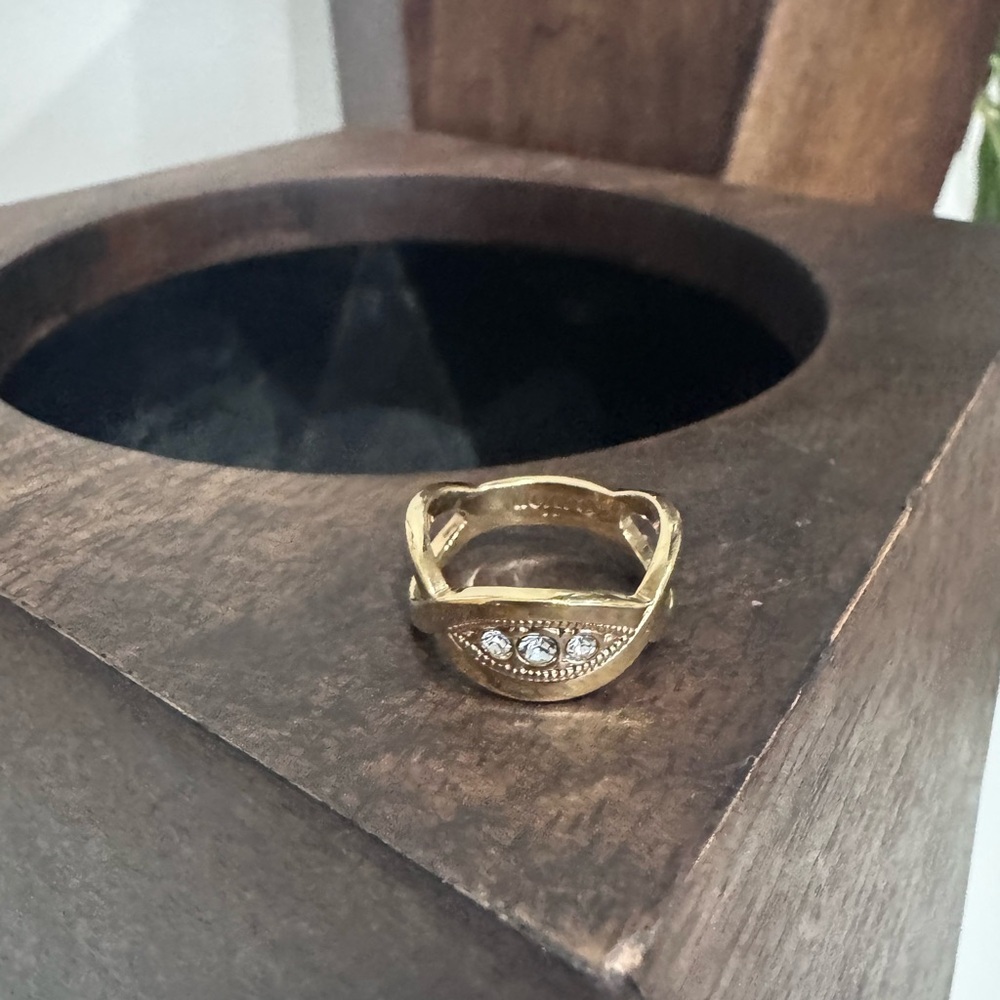 Vintage Avon Stella & Dot half moon pave rhinestone gold tone ring.